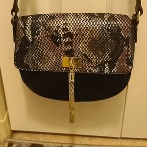 Black crossbody with snake print details
